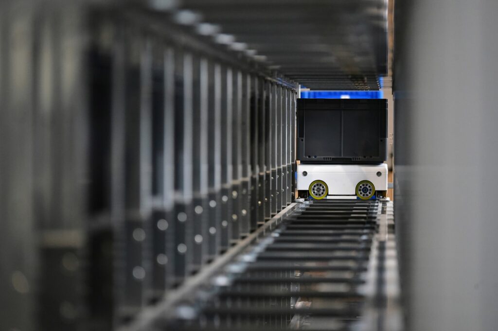 Racking systems increasingly accommodate robots which simplify the movement and retrieval of goods